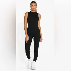 NWT Naked Wardrobe Crew Neck Black Sleeveless Jumpsuit